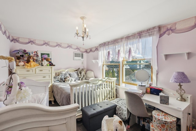 bedroom featuring a wall mounted air conditioner and a chandelier