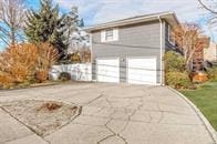 view of home's exterior featuring a garage