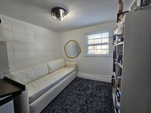 living room featuring a baseboard radiator and dark carpet