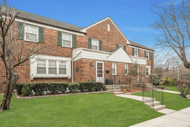 view of front of house with a front lawn