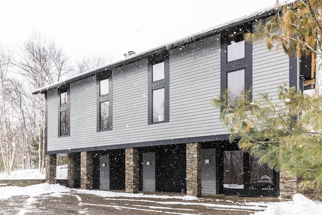 view of snow covered property