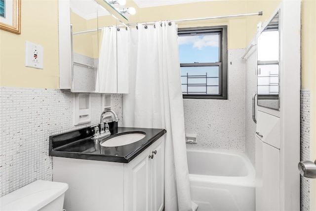 full bathroom with vanity, shower / tub combo, backsplash, and toilet