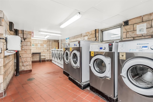 laundry area featuring washing machine and dryer