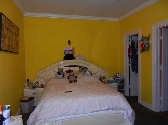 bedroom featuring crown molding