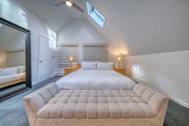 bedroom featuring lofted ceiling, baseboard heating, ceiling fan, and dark colored carpet