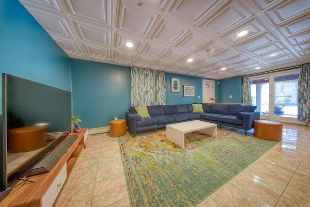 tiled living room featuring baseboard heating