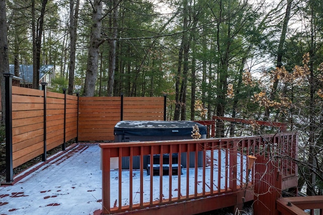 deck with a hot tub