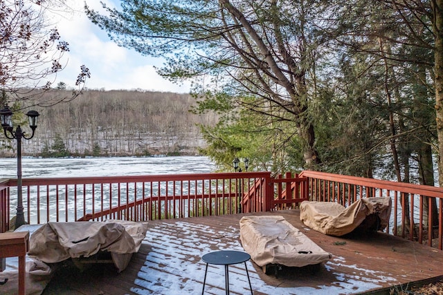 view of snow covered deck