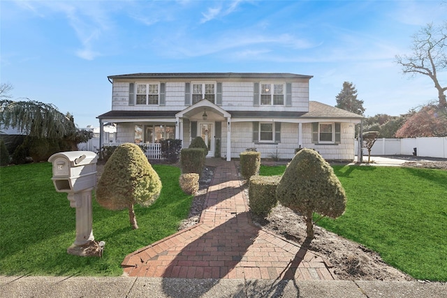 view of front of house with a front lawn