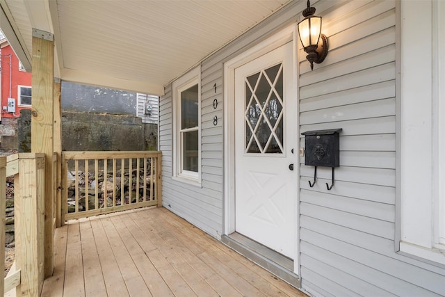 wooden terrace with a porch