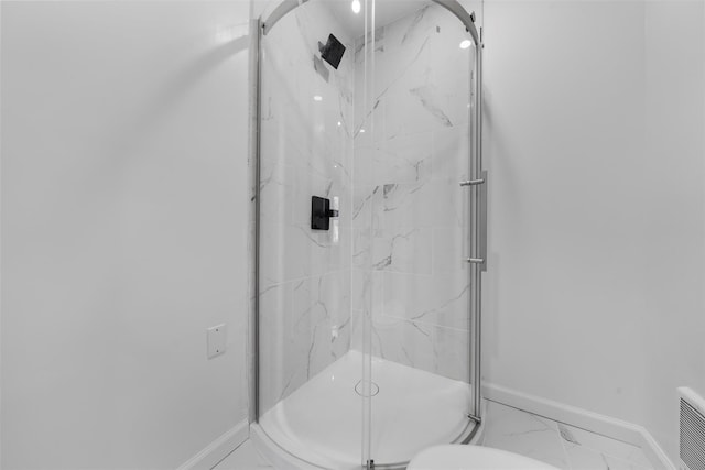 bathroom with an enclosed shower