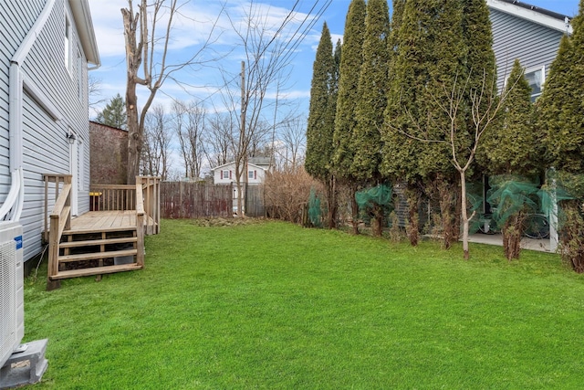 view of yard featuring a wooden deck