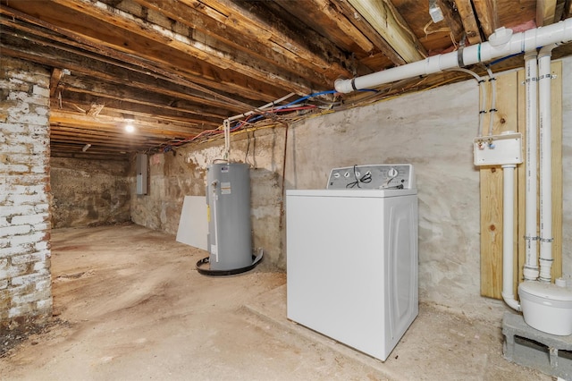 basement with washer / clothes dryer and water heater