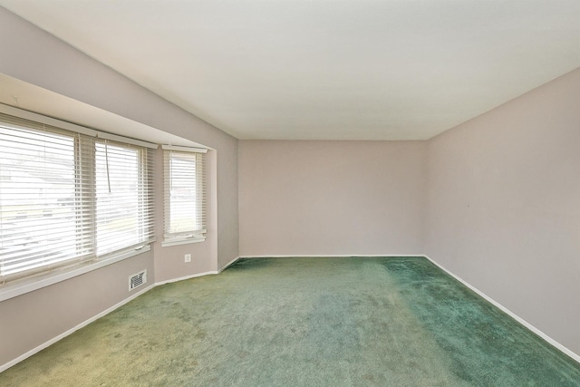 spare room with carpet flooring