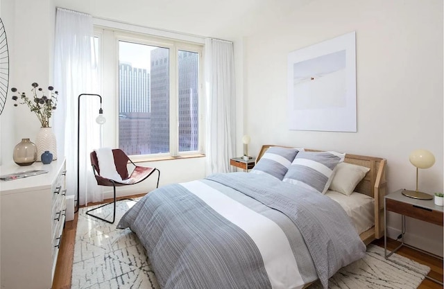 bedroom featuring light hardwood / wood-style flooring