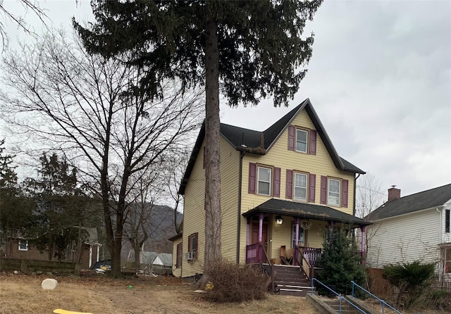 view of front of home featuring covered porch