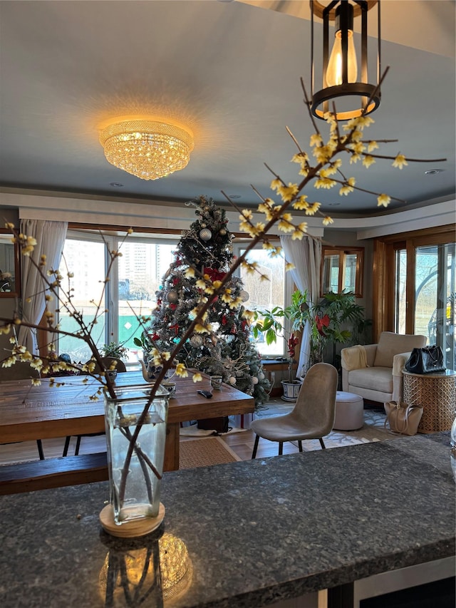 dining room featuring a notable chandelier and hardwood / wood-style flooring