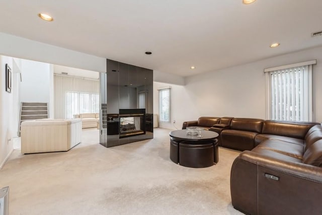 living room with light carpet