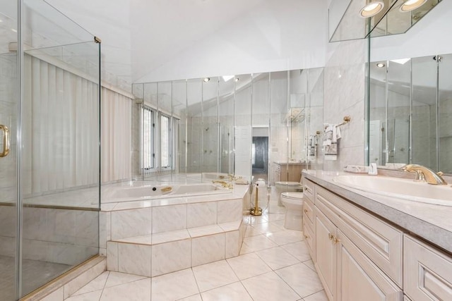 full bathroom with toilet, a high ceiling, tile patterned flooring, independent shower and bath, and vanity