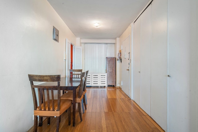 dining space featuring light hardwood / wood-style floors