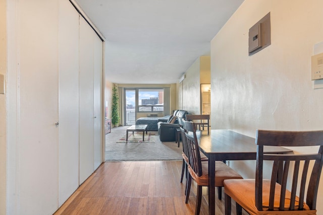 dining area featuring wood-type flooring