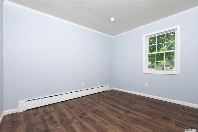 empty room featuring dark hardwood / wood-style flooring, crown molding, and a baseboard radiator