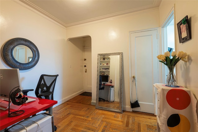 office with crown molding and light parquet floors