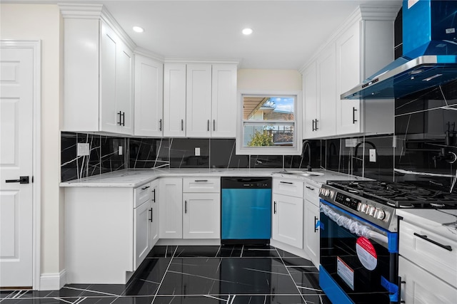 kitchen with light stone countertops, white cabinets, wall chimney exhaust hood, stainless steel appliances, and sink