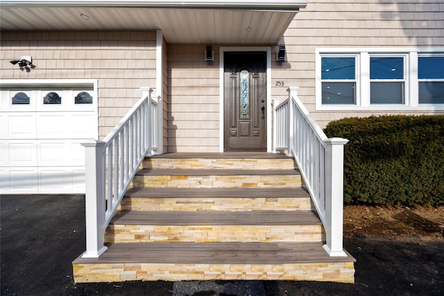 property entrance with a garage