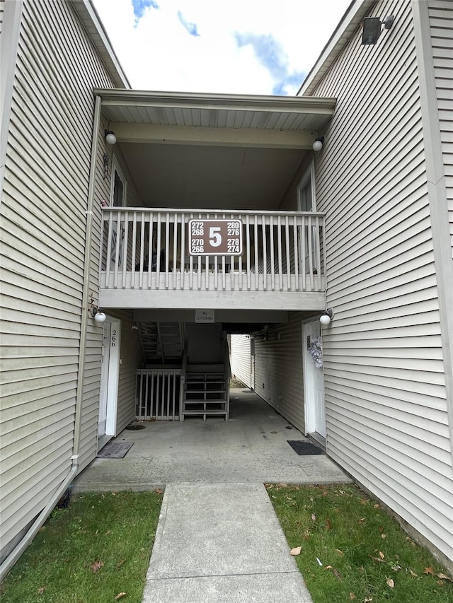 exterior space featuring a carport