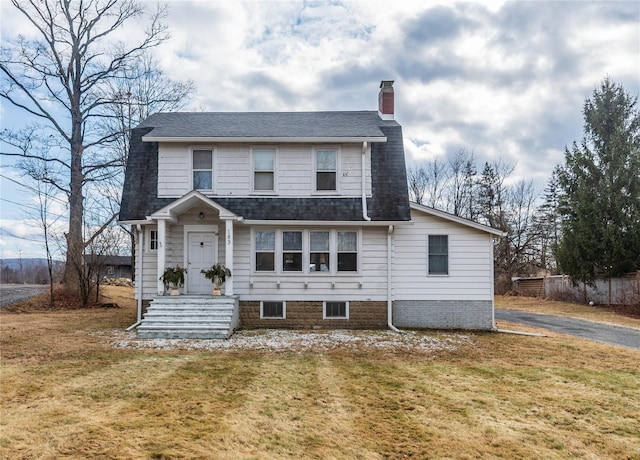 view of front of home with a front yard