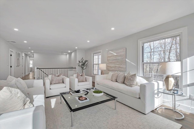 living room with light hardwood / wood-style floors