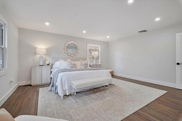 bedroom featuring dark hardwood / wood-style floors