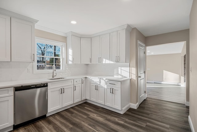 kitchen featuring white cabinets, dishwasher, and sink