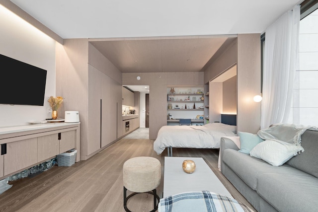 bedroom featuring light wood-type flooring