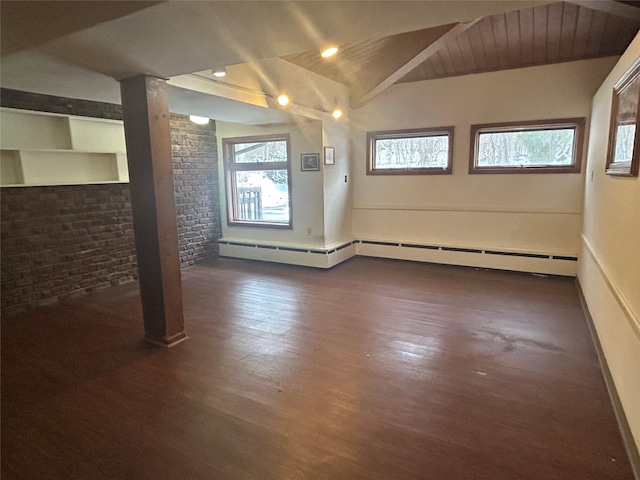 interior space with vaulted ceiling, dark hardwood / wood-style floors, and brick wall