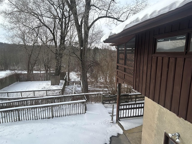 view of snow covered deck