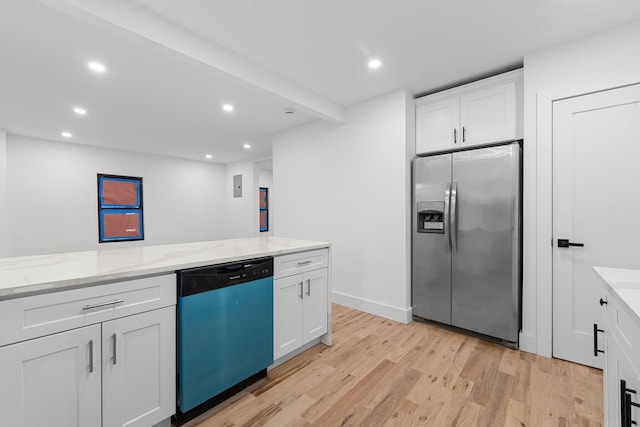 kitchen featuring stainless steel appliances, white cabinetry, light hardwood / wood-style floors, and light stone counters