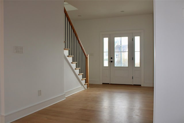 foyer entrance featuring light wood-type flooring