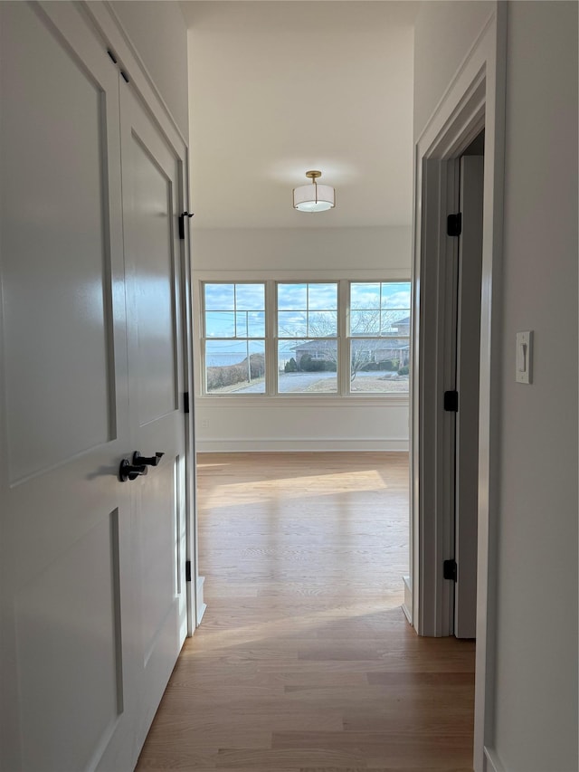 hall featuring light wood-type flooring