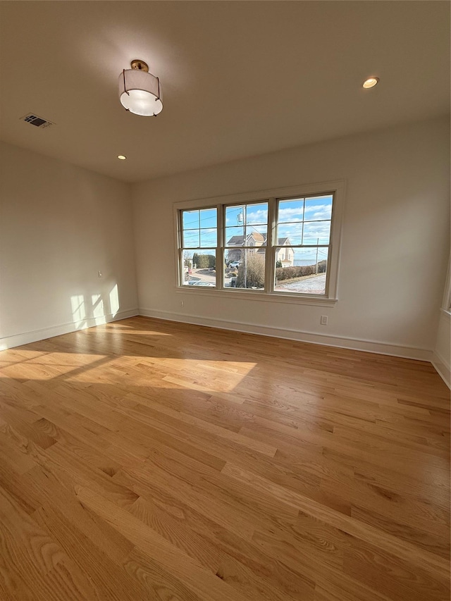 empty room featuring light hardwood / wood-style floors