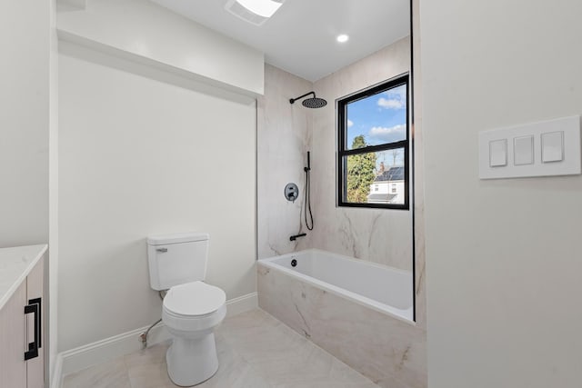 full bathroom featuring tile patterned flooring, vanity, toilet, and tiled shower / bath