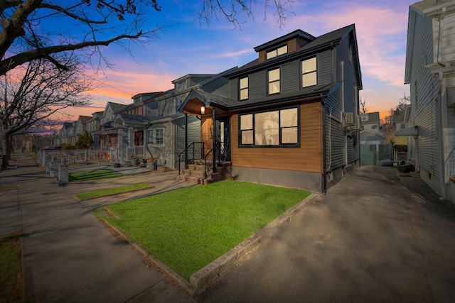 contemporary home featuring a lawn