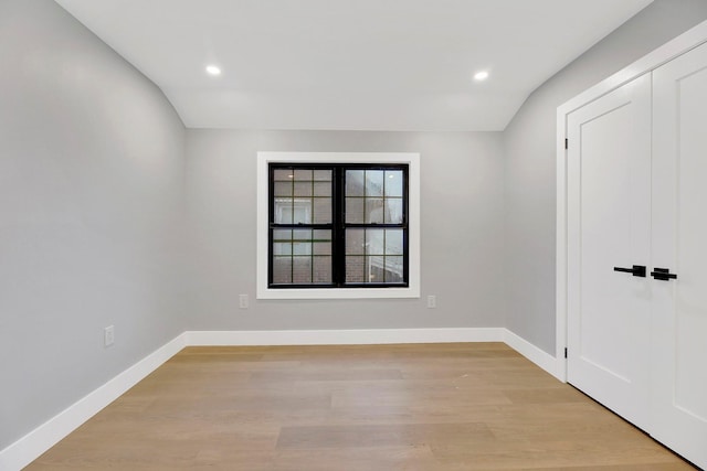 spare room featuring light hardwood / wood-style floors