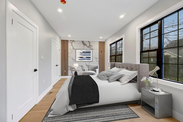 bedroom featuring light wood-type flooring