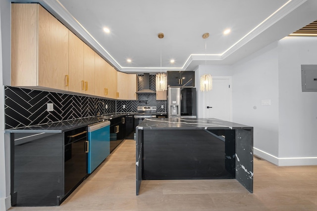 kitchen featuring appliances with stainless steel finishes, a kitchen island, decorative light fixtures, light brown cabinets, and wall chimney exhaust hood