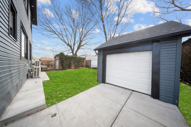 garage with a lawn