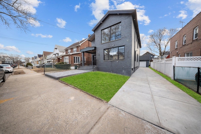 view of front of house featuring a front yard