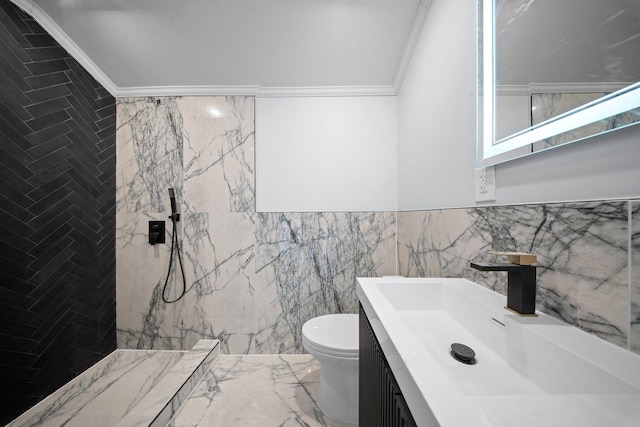 bathroom featuring vanity, ornamental molding, toilet, and a tile shower