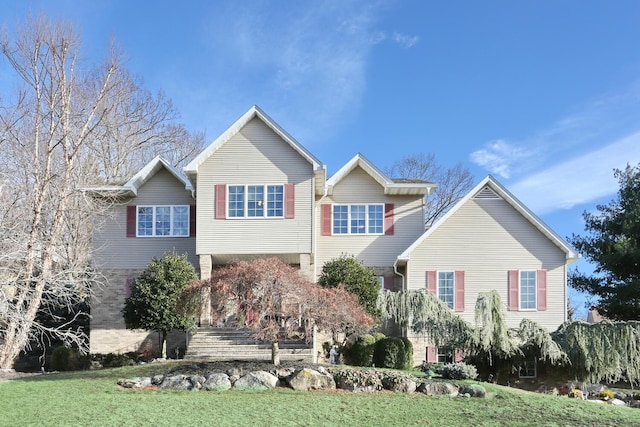 view of front of home featuring a front lawn